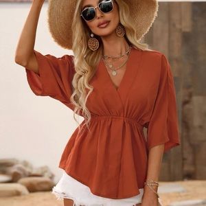 BATWING PEPLUM TOP